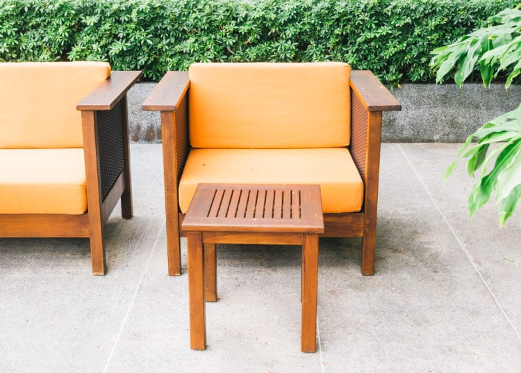 Wooden sofa and chair with outdoor patio