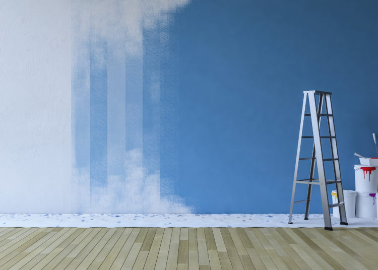 3d rendering image of painting blue wall in an empty room. ladder and paiting tools placed on timber floor.