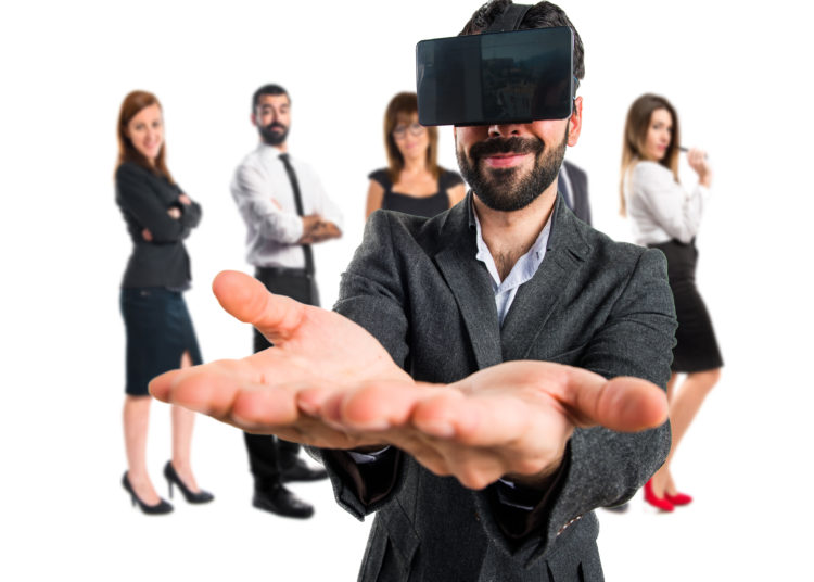 Man using VR glasses holding something