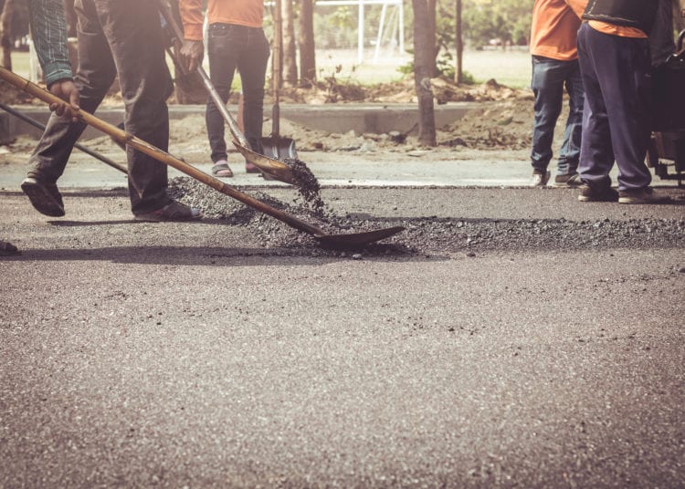 Workers on a road construction