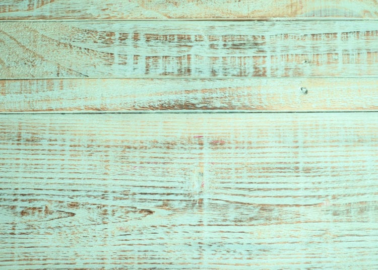 rough wall texture color, wood background.