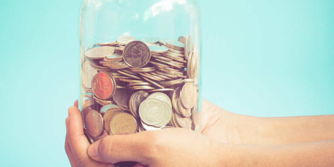 Hands holding money with filter effect retro vintage style