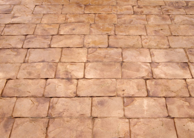 paving slabs,running bond patterned paving tiles, cement brick floor in the patio 