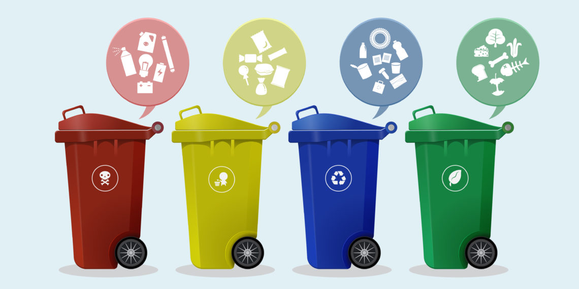 Different Colored wheelie bins set with waste icon, illustration of waste management concept