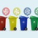 Different Colored wheelie bins set with waste icon, illustration of waste management concept