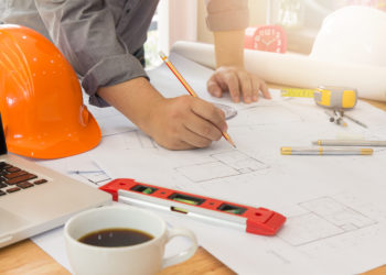 Architect concept, Architects office working with blueprints