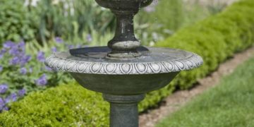 Beautiful fountain in the garden, summer time