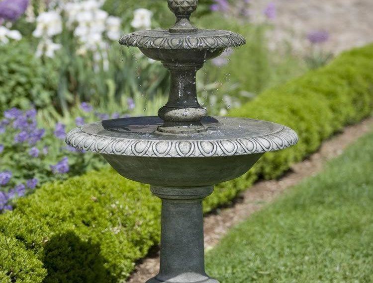 Beautiful fountain in the garden, summer time