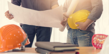 Architect concept, Architects office working with blueprints, Vintage Effect