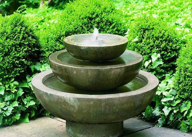 Beautiful fountain in the garden, summer time