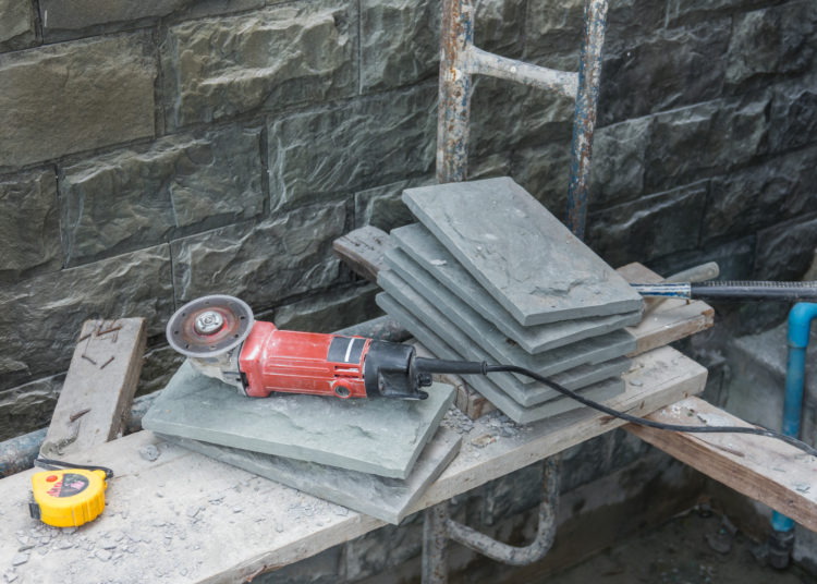 Cutting and grinding concrete or metal using a cut-off saw