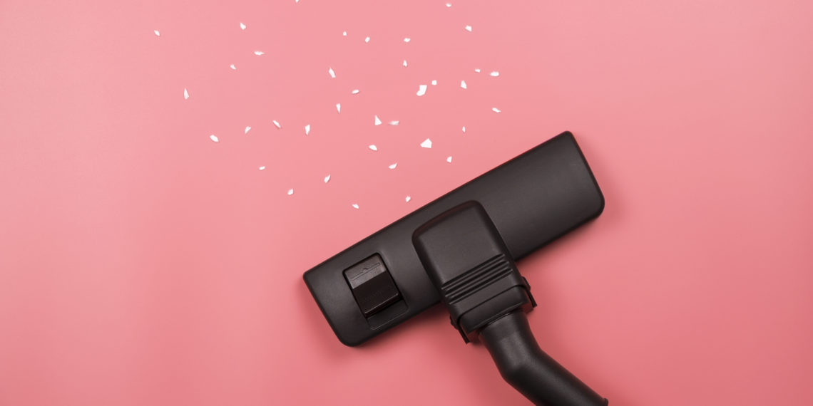 A vacuum cleaner on the pink background