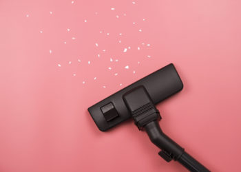 A vacuum cleaner on the pink background