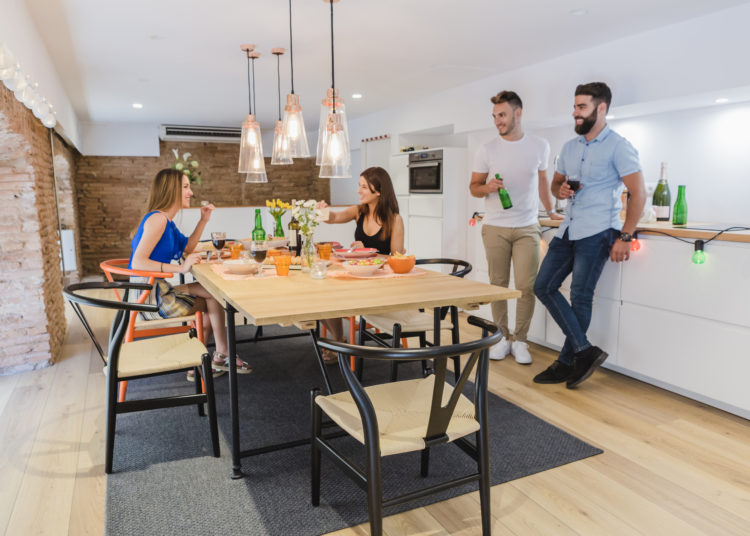 Friends enjoying a dinner in the modern dining room space