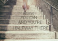 Inspirational quote on woman walk on stair background with vintage filter