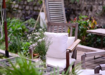 Patio space decorated with flowers.