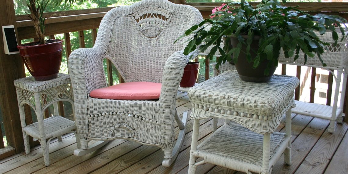 Wide rocking chair in the backyard