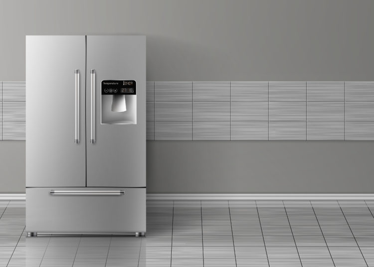 Vector 3d realistic mock up with gray two-chambered refrigerator isolated on tile wall. Modern smart appliance in kitchen, background for design. Decorative template with fridge.