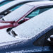 Snow covered cars in the parking, close up. Antifreeze was not used. Vehicles in snow. Winter time is coming. Bad weather conditions
