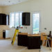 Installing new induction hob in modern kitchen cabinets installation