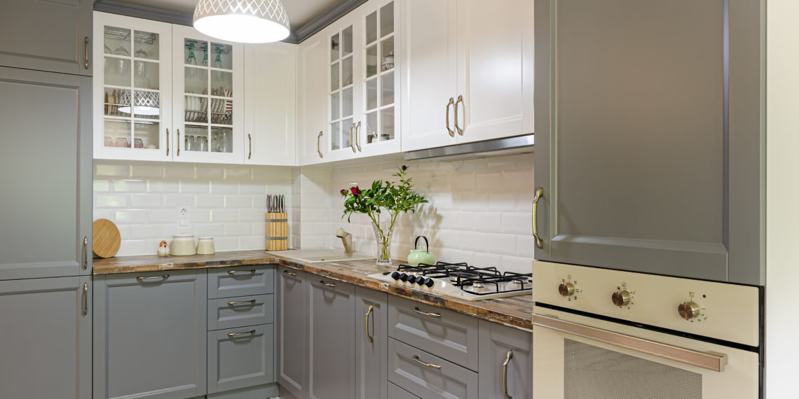 interior of modern luxury grey and white wooden kitchen