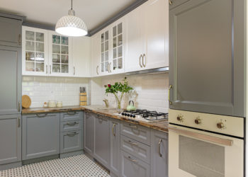 interior of modern luxury grey and white wooden kitchen