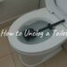 A clogged toilet with rising water, plunger nearby, realistic bathroom setting.