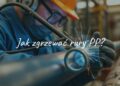 A worker welding PP pipes, close-up of heated pipe ends, industrial setting, realistic.